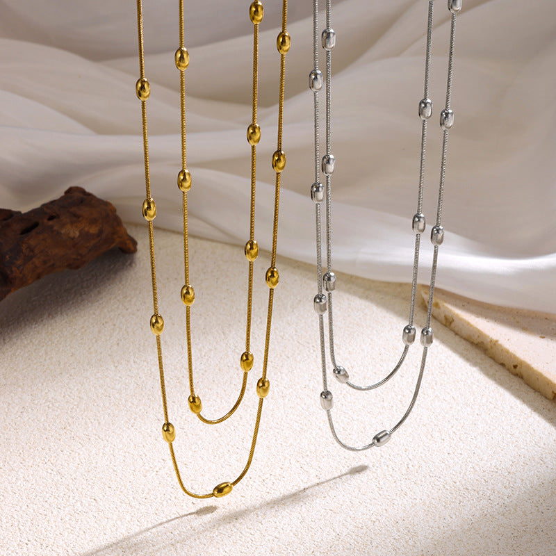 Collar multicapa de cadena y cuentas – look boho chic y efecto layering sin esfuerzo
