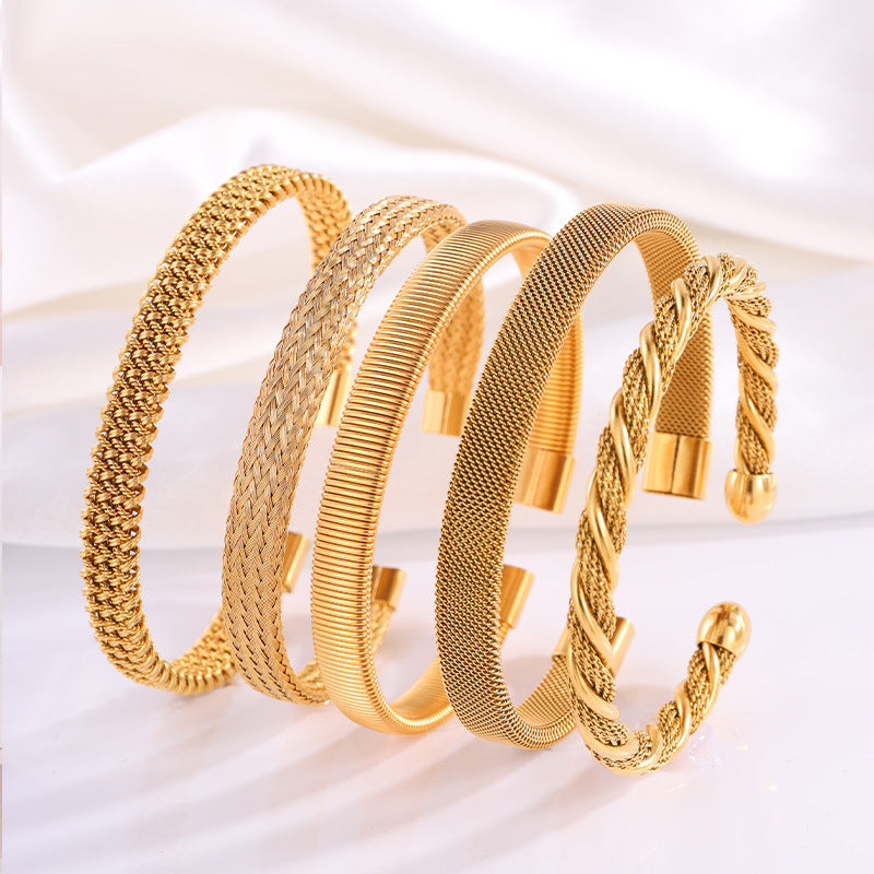 Pulsera abierta trenzada de acero titanio ajustable